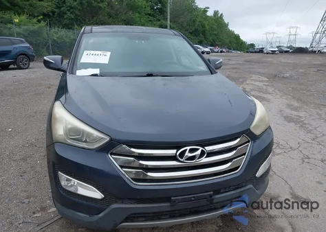 2013 Hyundai Santa Fe Sport 2.0T z USA, uszkodzony, nr VIN 5XYZWDLA4DG031060